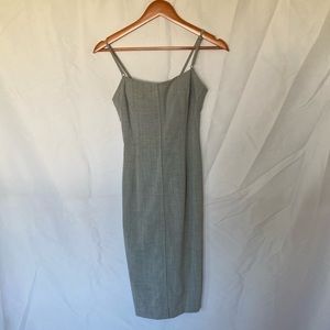 Gray BCBG gray dress with open detail back and built in bra sz 0